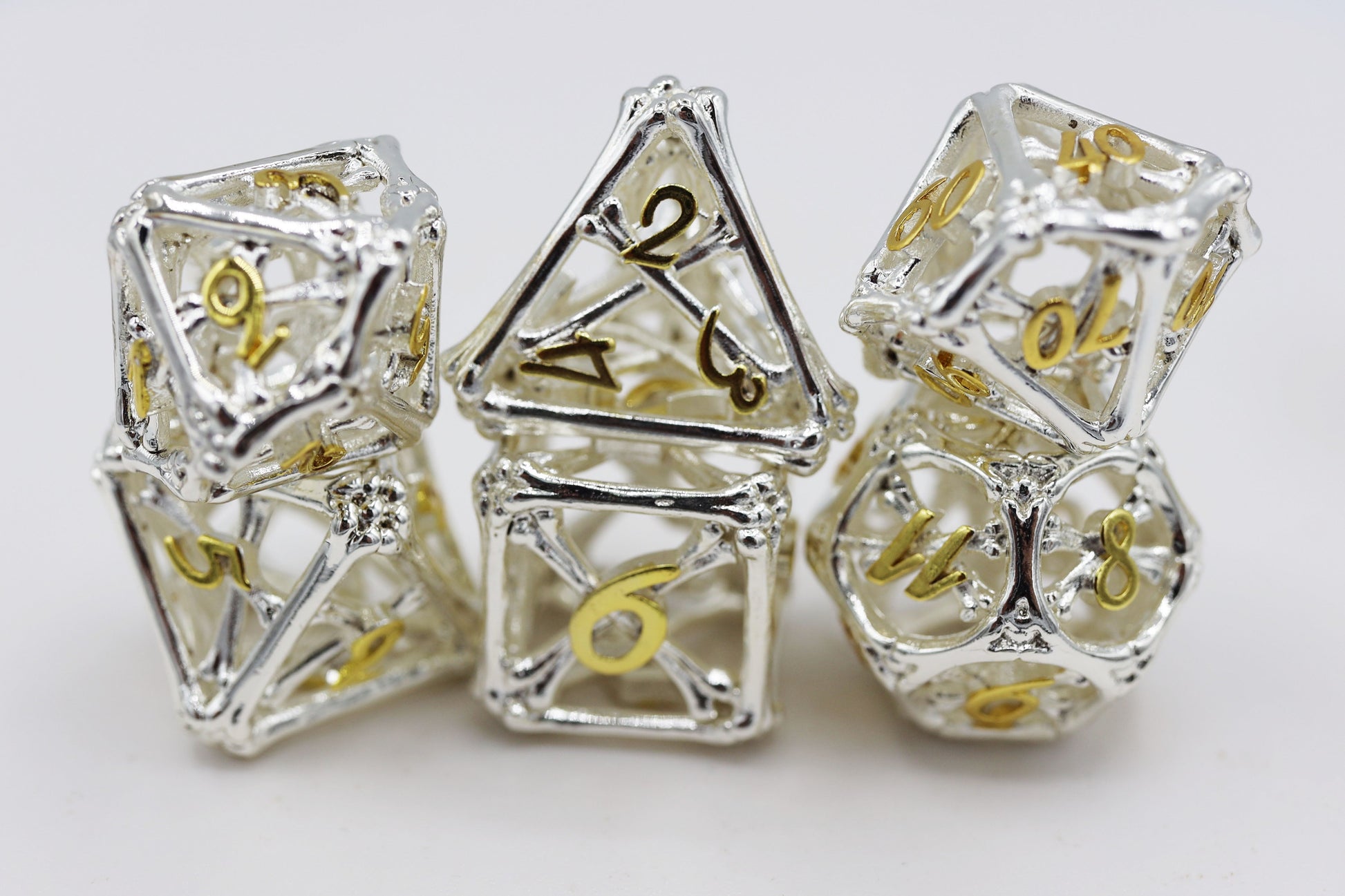 Holy Bones - Hollow Metal RPG Dice Set product image