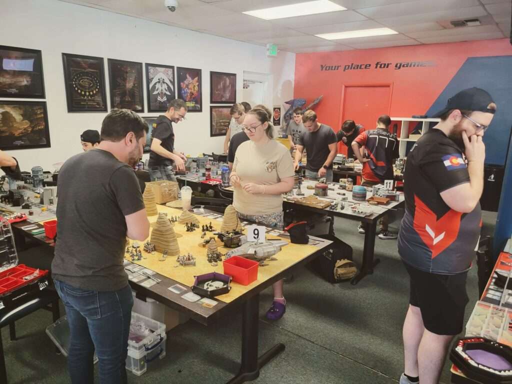 Gamers playing in a miniatures tournament